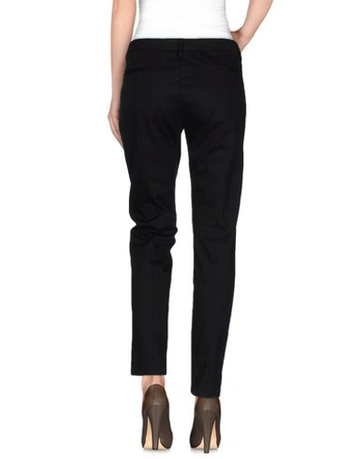 Shop Love Moschino Casual Pants In Black