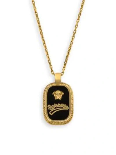 Shop Versace Logo Pendant Necklace In Black Gold
