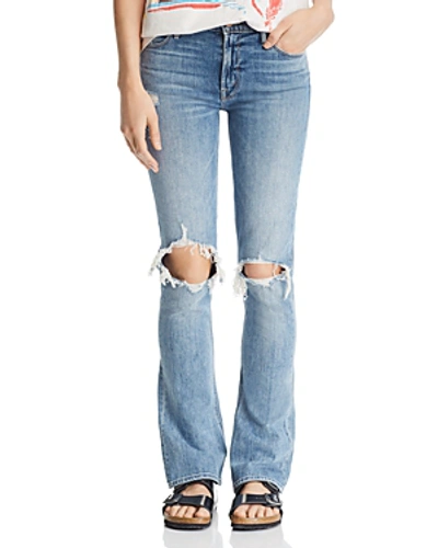 Shop Mother The Runaway Weekender Distressed Bootcut Jeans In Helter Skelter