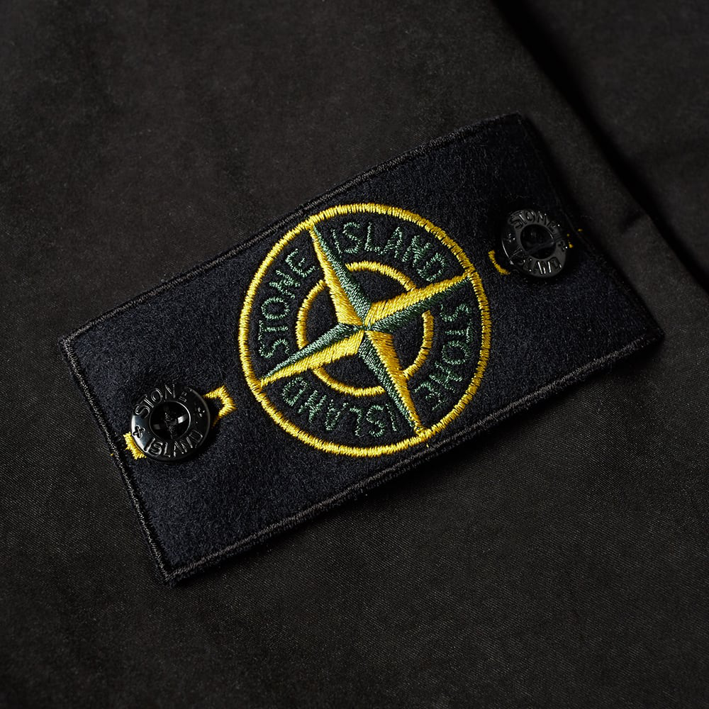 Что значит стоник. Нашивка стон айленд оригинал. Что значит стоник. Stone island патч. Черно белый патч.