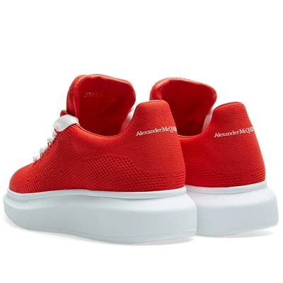 Shop Alexander Mcqueen Knitted Wedge Sole Sneaker In Red