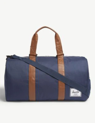 Shop Herschel Supply Co Novel Canvas Duffle Bag In Navy/tan