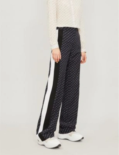 Shop Stella Mccartney Logo-print Silk Crepe-de-chine Trousers In Ink