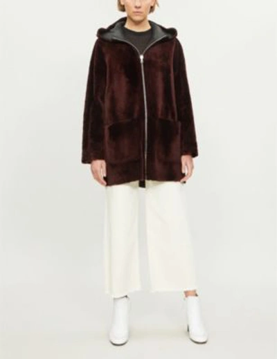 Shop Sandro Reversible Hooded Leather And Shearling Coat In Bordeaux