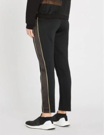 Shop Puma X Kenza Stretch-jersey Jogging Bottoms In Black