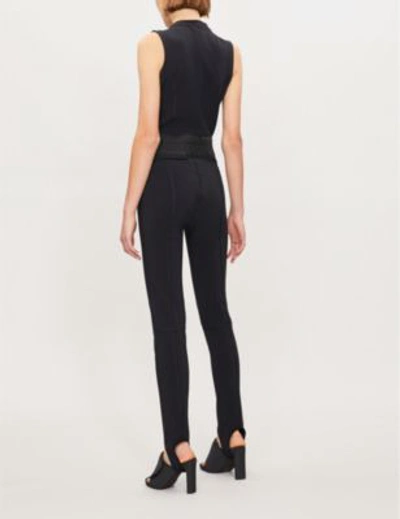 Shop Moncler Belted Shell Jumpsuit In Black