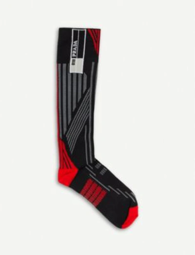 Shop Prada Striped Geometric Knitted Socks In Nero/rosso
