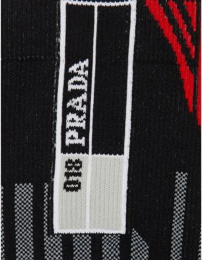 Shop Prada Striped Geometric Knitted Socks In Nero/rosso