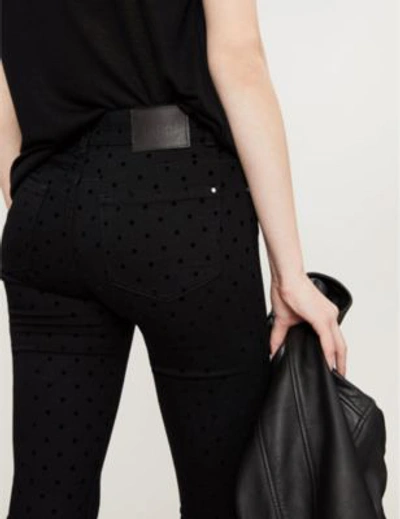 Shop Claudie Pierlot Patiente Velvet Polka Dot Skinny High-rise Jeans In Noir