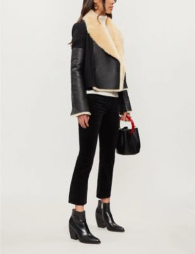 Shop J Brand Selena Bootcut Cropped Mid-rise Velvet Jeans In Black