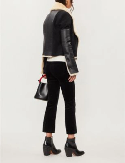Shop J Brand Selena Bootcut Cropped Mid-rise Velvet Jeans In Black
