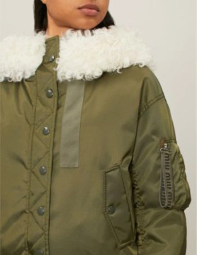 Shop Miu Miu Shearling-trimmed Shell Bomber Jacket In Oliva