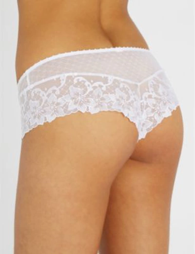 Shop Aubade Wandering Sheer-lace Thongs In White