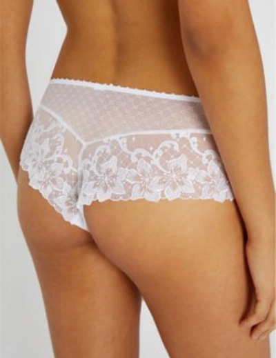 Shop Aubade Wandering Sheer-lace Thongs In White