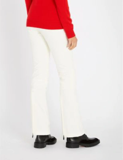 Shop Perfect Moment Aurora Mid-rise Stretch Flared Ski Trousers In Snow White