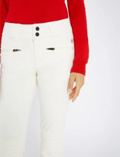 Shop Perfect Moment Aurora Mid-rise Stretch Flared Ski Trousers In Snow White