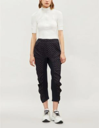 Shop Stella Mccartney Logo-print Ruched Cropped Crepe Trousers In Ink