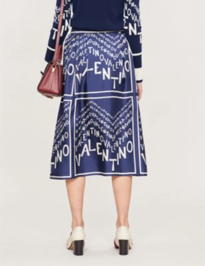 Shop Valentino Logo-print Silk-satin Midi Skirt In Almond Pure Blue