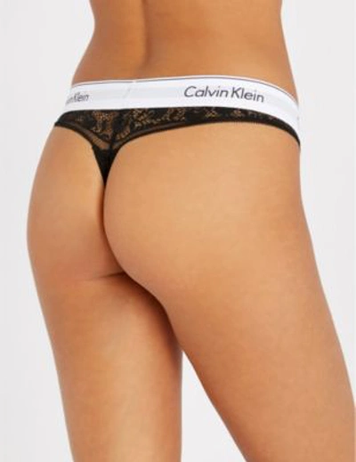 Shop Calvin Klein Modern Cotton Jersey And Lace Thong In 001 Black