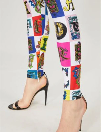 Shop Versace Logo-print Stretch-jersey Leggings In Printed Bckgrnd White