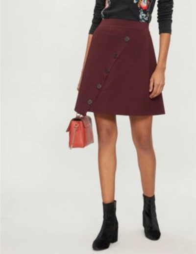 Shop Sandro Asymmetric Button-down Knitted Skirt In Burgundy