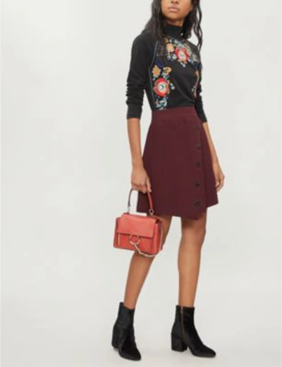 Shop Sandro Asymmetric Button-down Knitted Skirt In Burgundy