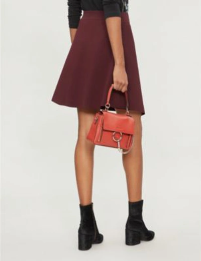 Shop Sandro Asymmetric Button-down Knitted Skirt In Burgundy