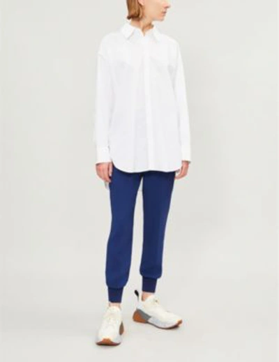 Shop Stella Mccartney Julia High-rise Tapered Crepe Trousers In Blue Note