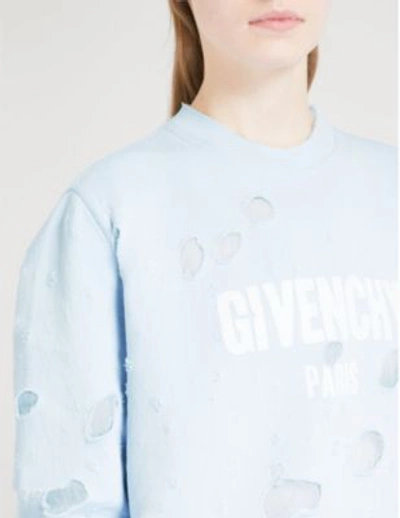 Shop Givenchy Destroyed Logo Cotton-jersey Sweatshirt In Light Blue