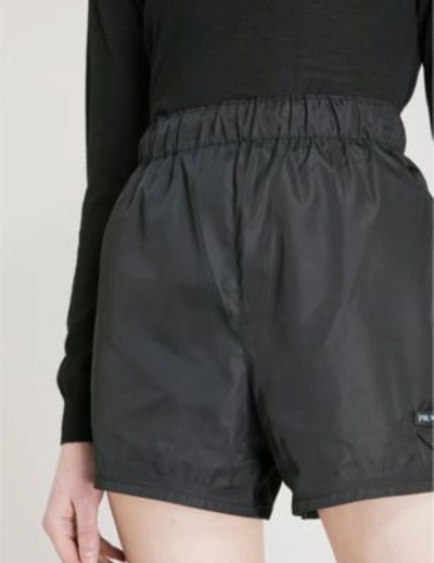 Shop Prada Logo-embroidered Nylon Shorts In Nero