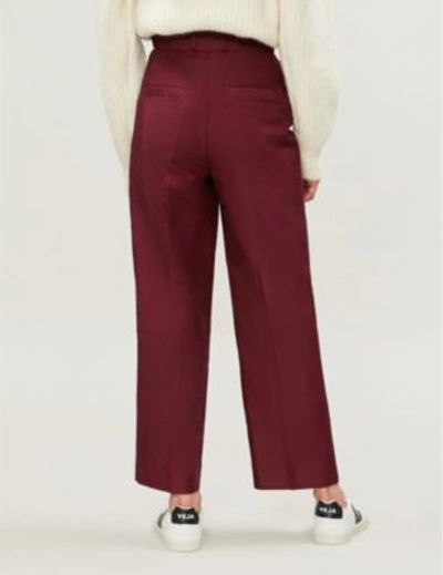 Shop Sandro Aloes Belted High-rise Wide-leg Cotton-blend Twill Trousers In Burgundy