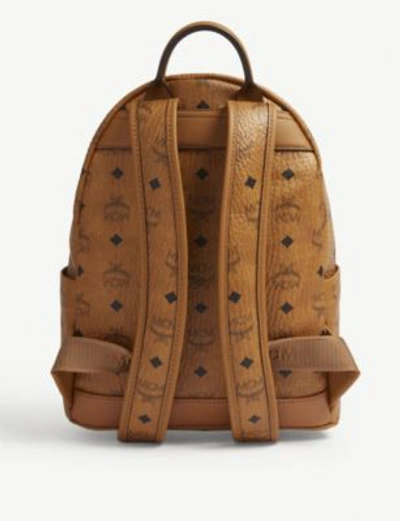 Shop Mcm Trilogie Leather Backpack In Cognac