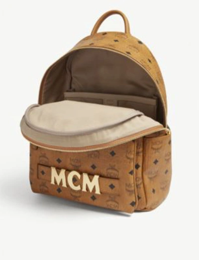 Shop Mcm Trilogie Leather Backpack In Cognac