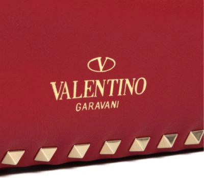 Shop Valentino Rockstud Medium Tote In Red