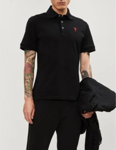 Shop Alexander Mcqueen Skeleton-embroidered Cotton-piqué Polo Shirt In Black