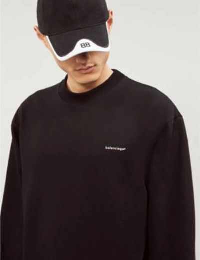 Shop Balenciaga Logo-print Cotton-jersey Sweatshirt In Black