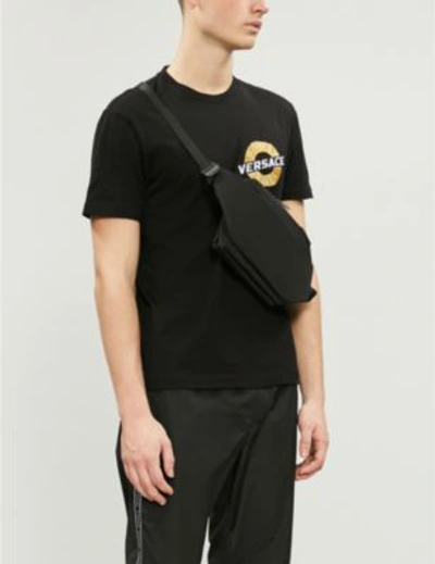 Shop Versace Logo-embroidered Cotton-jersey T-shirt In Nero