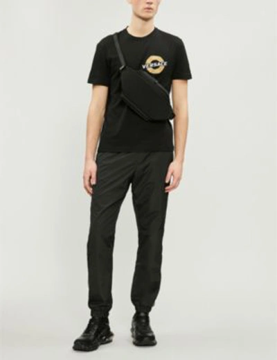 Shop Versace Logo-embroidered Cotton-jersey T-shirt In Nero