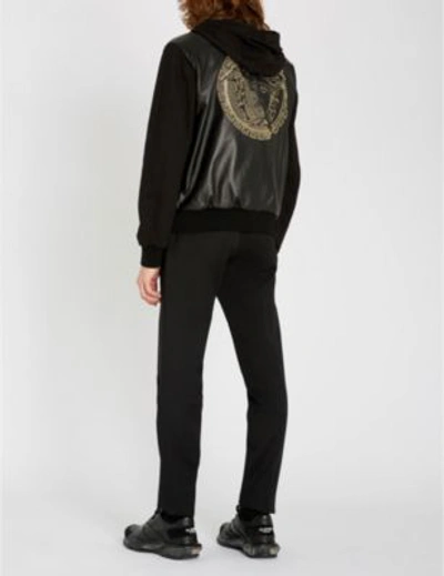 Shop Versace Logo-print Leather And Cotton-jersey Hooded Jacket In Nero