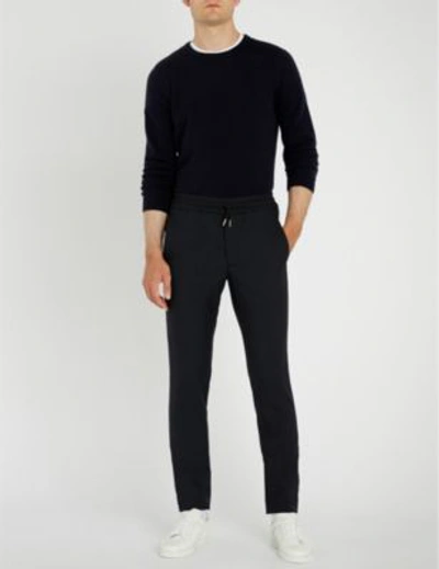 Shop Sandro Regular-fit Tapered Woven Trousers In Marine