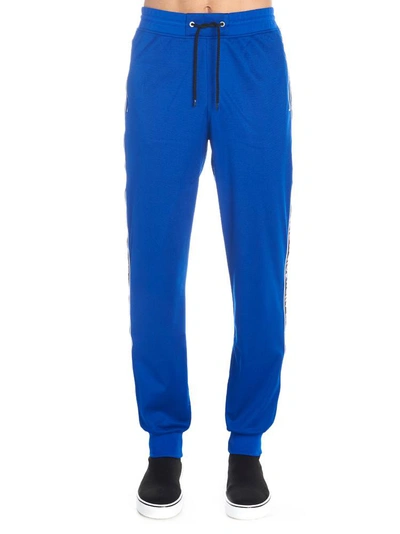 Shop Givenchy Logo Tape Sweatpants In Blue