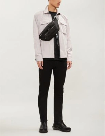 Shop Valentino Rockstud-embellished Slim-fit Skinny Jeans In Nero