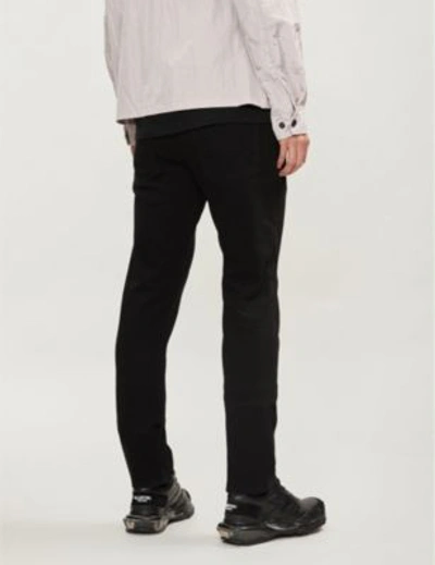 Shop Valentino Rockstud-embellished Slim-fit Skinny Jeans In Nero
