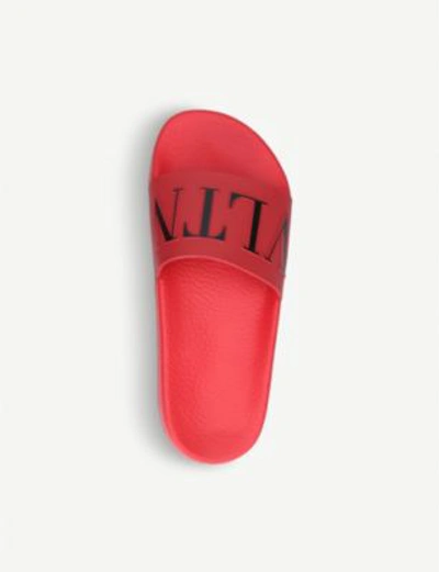 Shop Valentino Vltn Rubber Sliders In Red