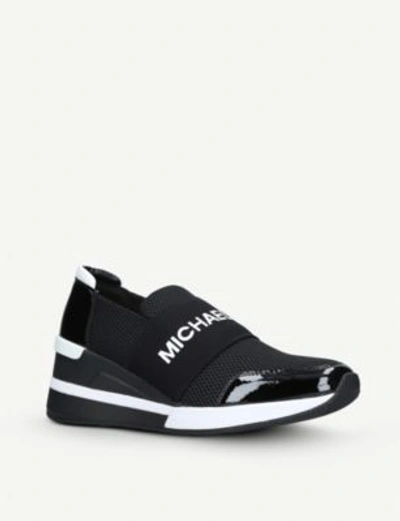 Shop Michael Michael Kors Felix Patent Leather And Mesh Trainers In Black