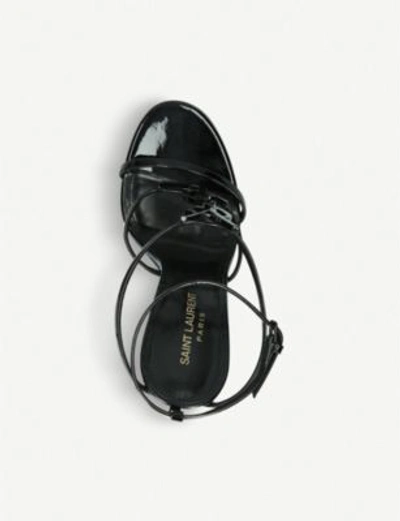 Shop Saint Laurent Cassandra 110 Patent-leather Heeled Sandals In Black