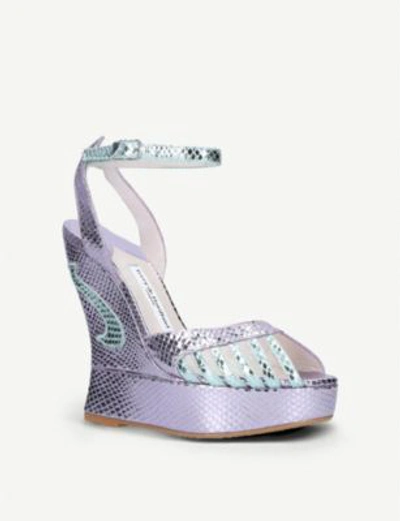 Shop Terry De Havilland Margaux Metallic Snake-effect Leather Wedge Sandals In Lilac