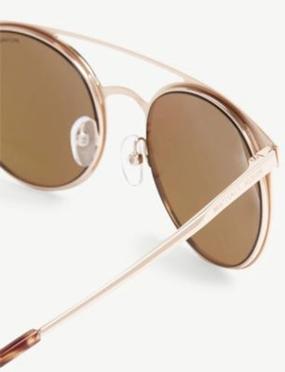 Shop Michael Kors Grayton Round-frame Sunglasses In Shiny Rose Gold
