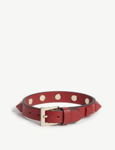 Shop Valentino Rockstud Small Leather Bracelet In Red/red
