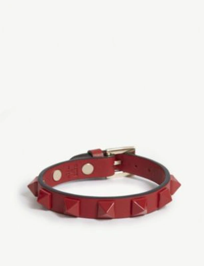 Shop Valentino Rockstud Small Leather Bracelet In Red/red